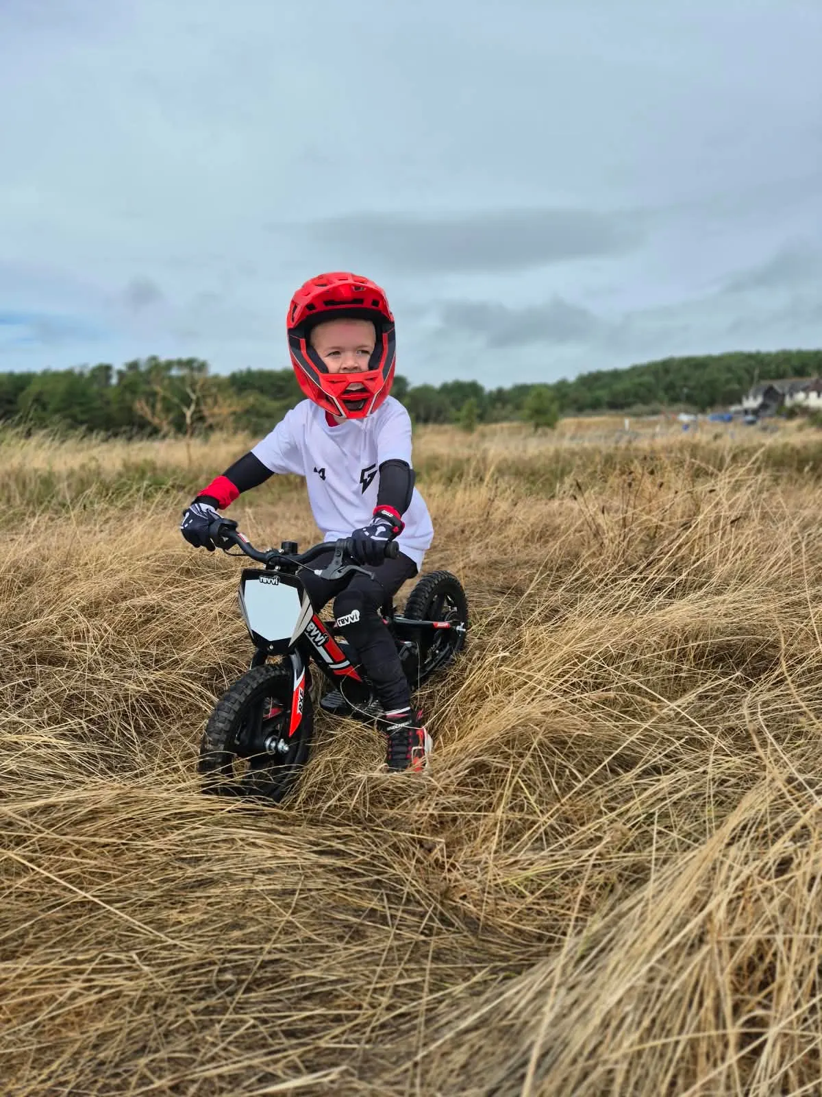 Revvi 12 electric balance bike for a young first-time rider