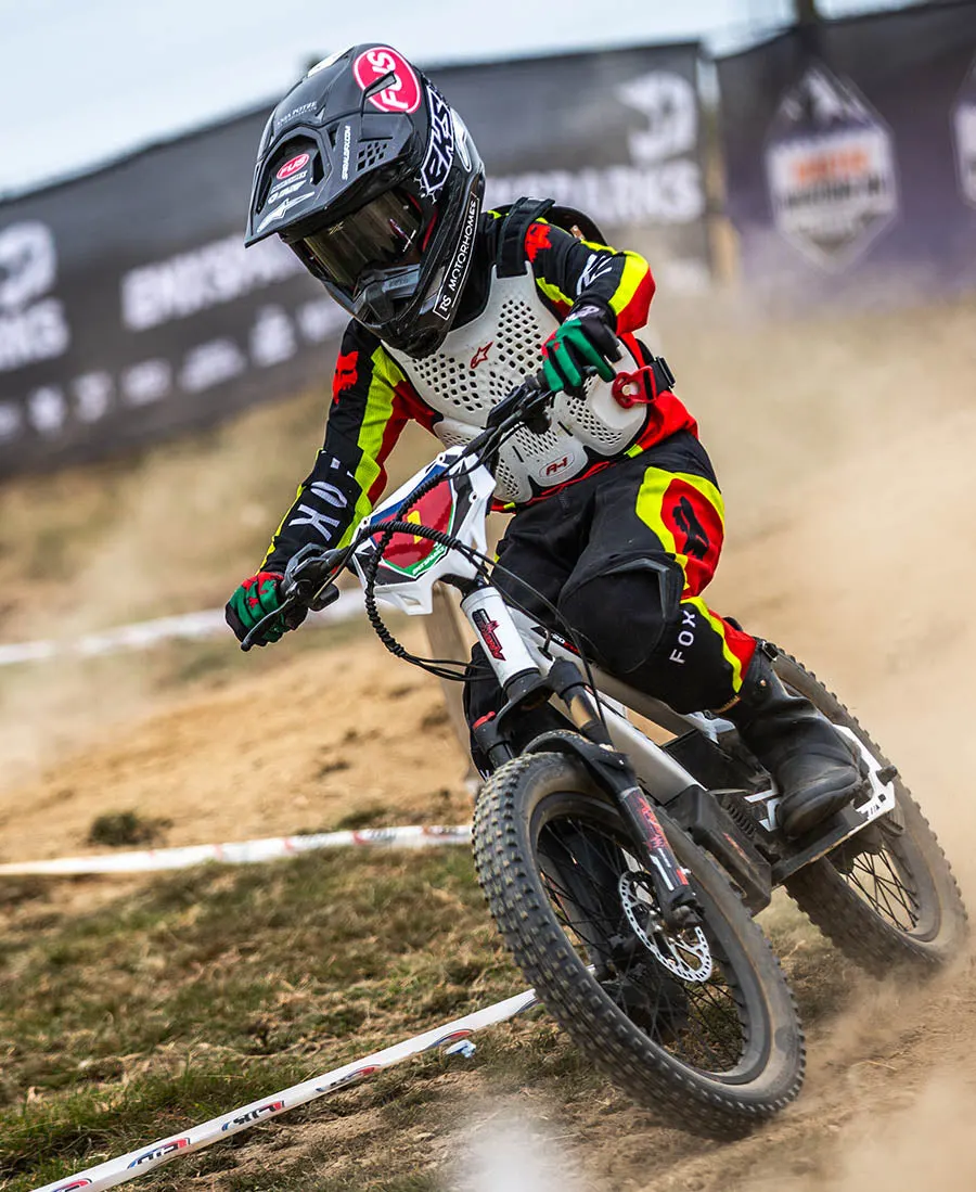 Older child riding an Amped A20 Pro electric bike