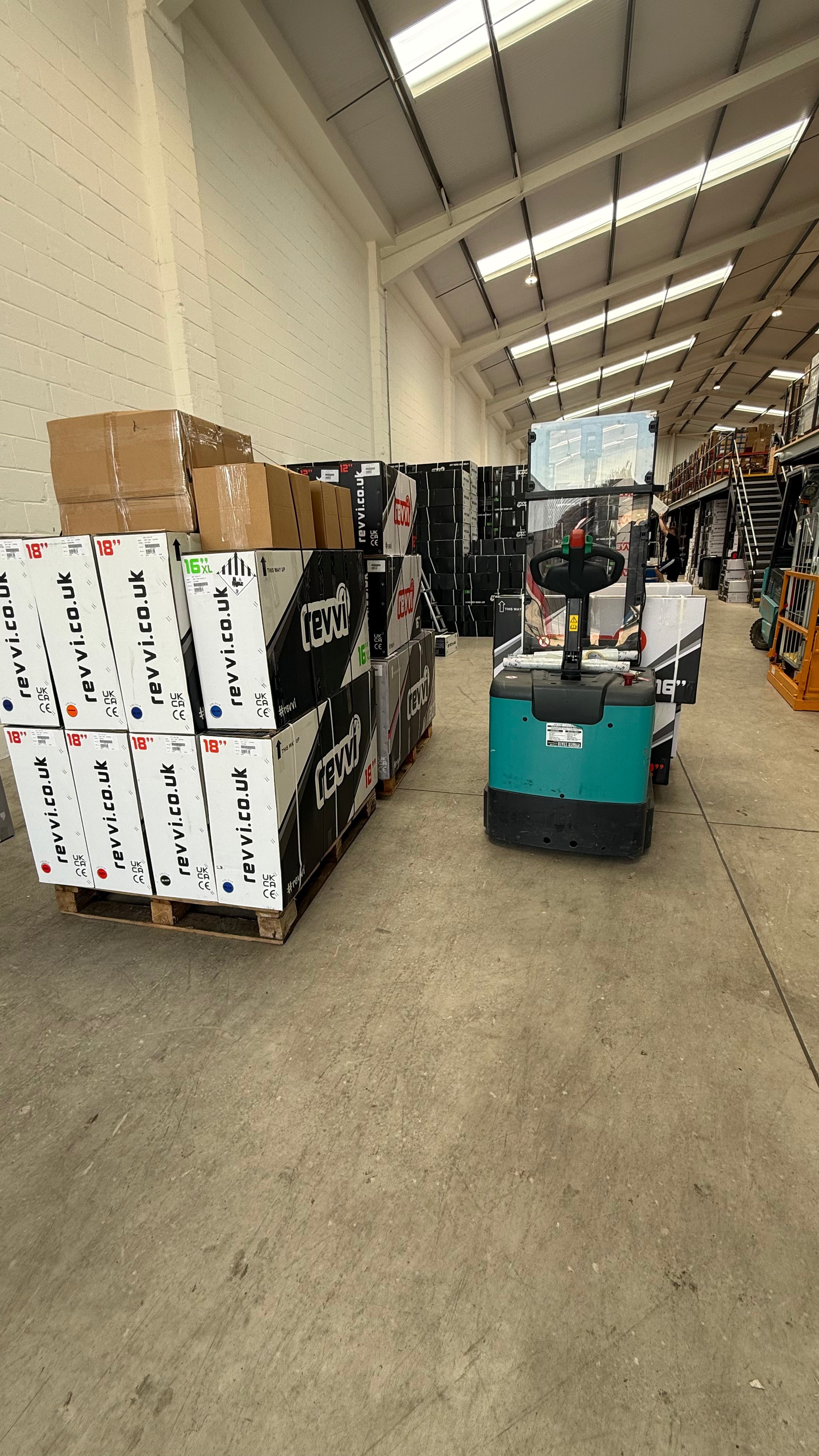 Garland Powersports boxed bikes and UK warehouse stock ready for dispatch