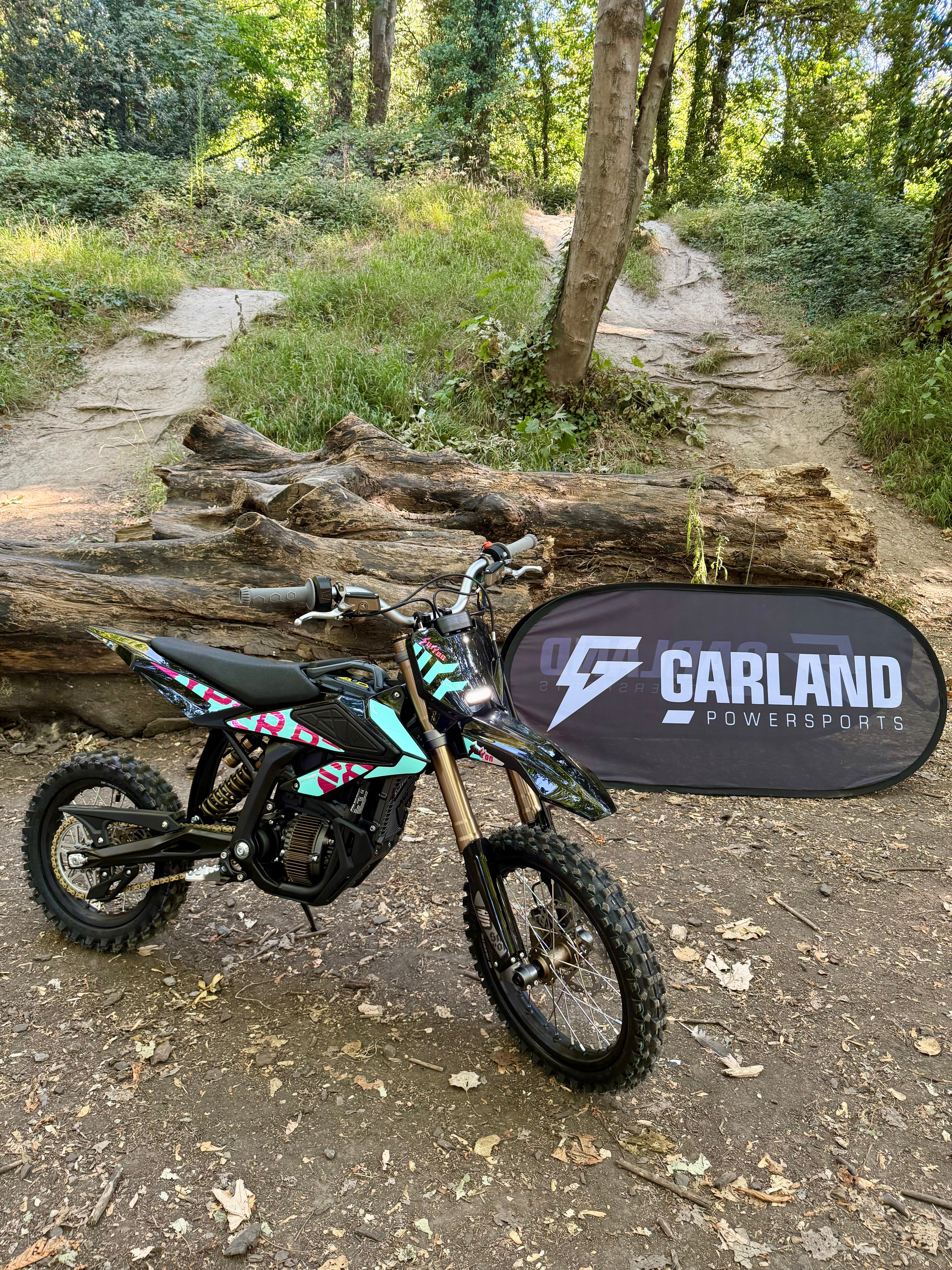 Sur-Ron Hyper Bee being used off road by a youth rider