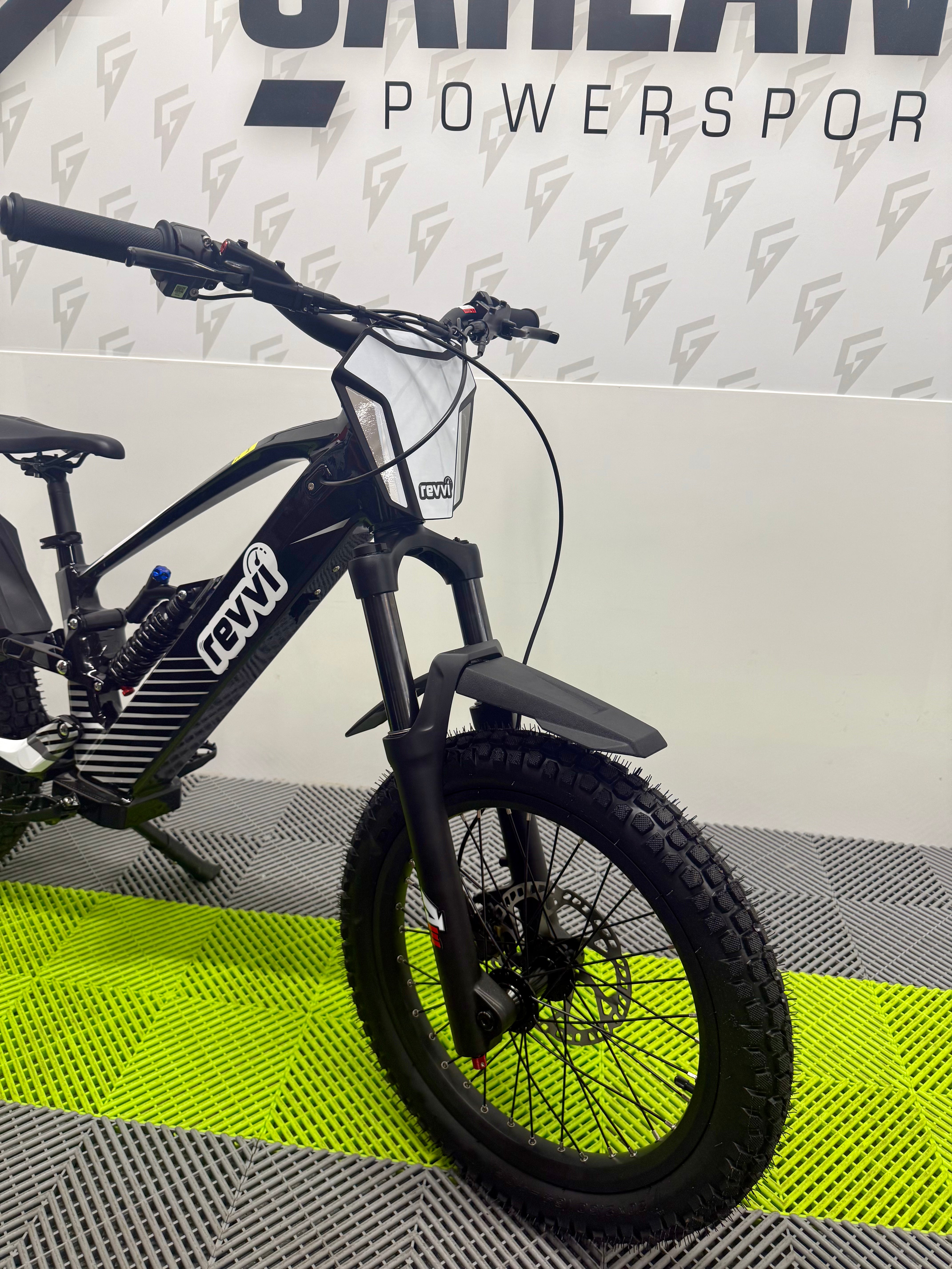 Revvi 20 Plus front suspension and 20-inch wheel photographed at Garland Powersports