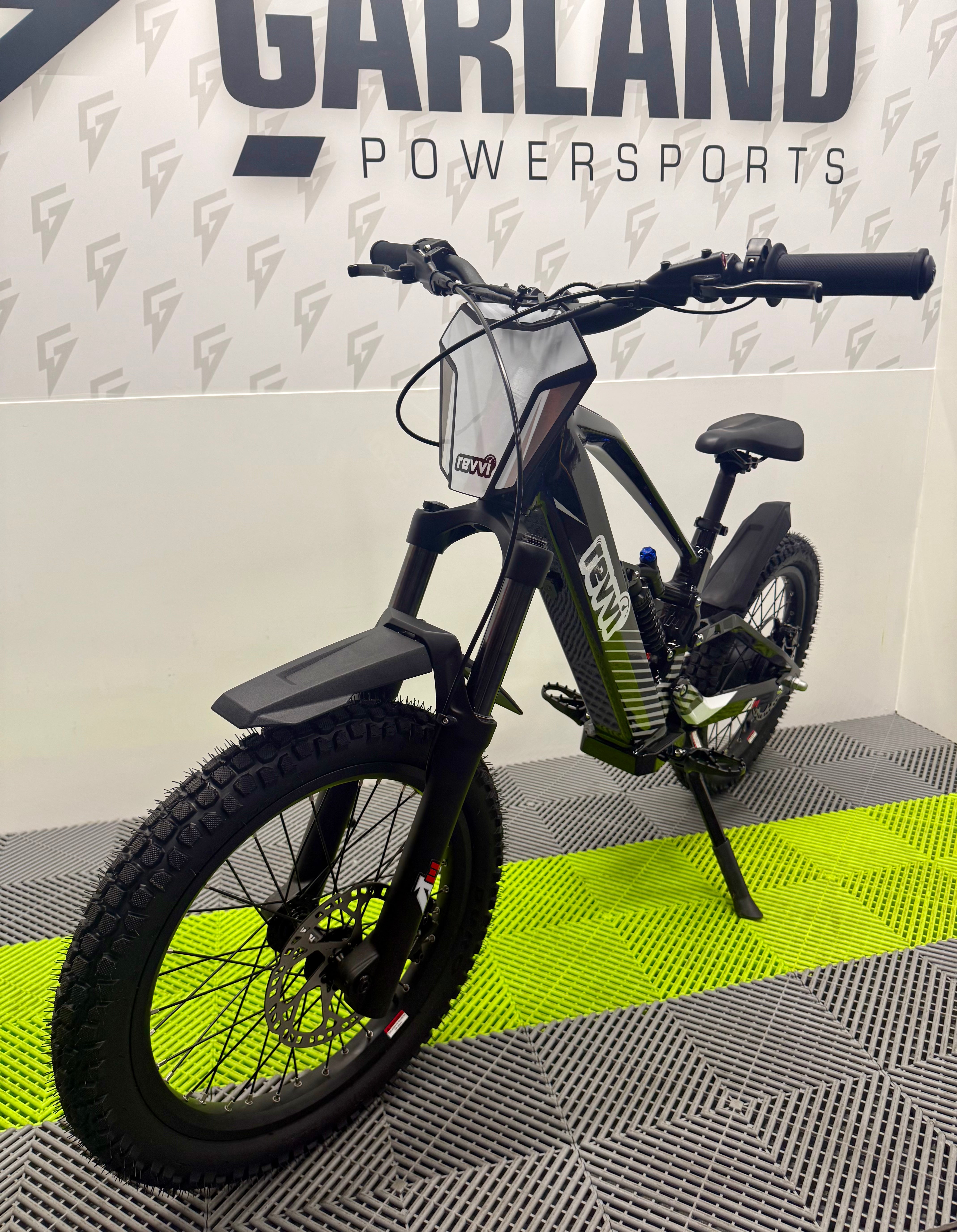 Revvi 20 Plus premium 48V electric bike photographed at Garland Powersports