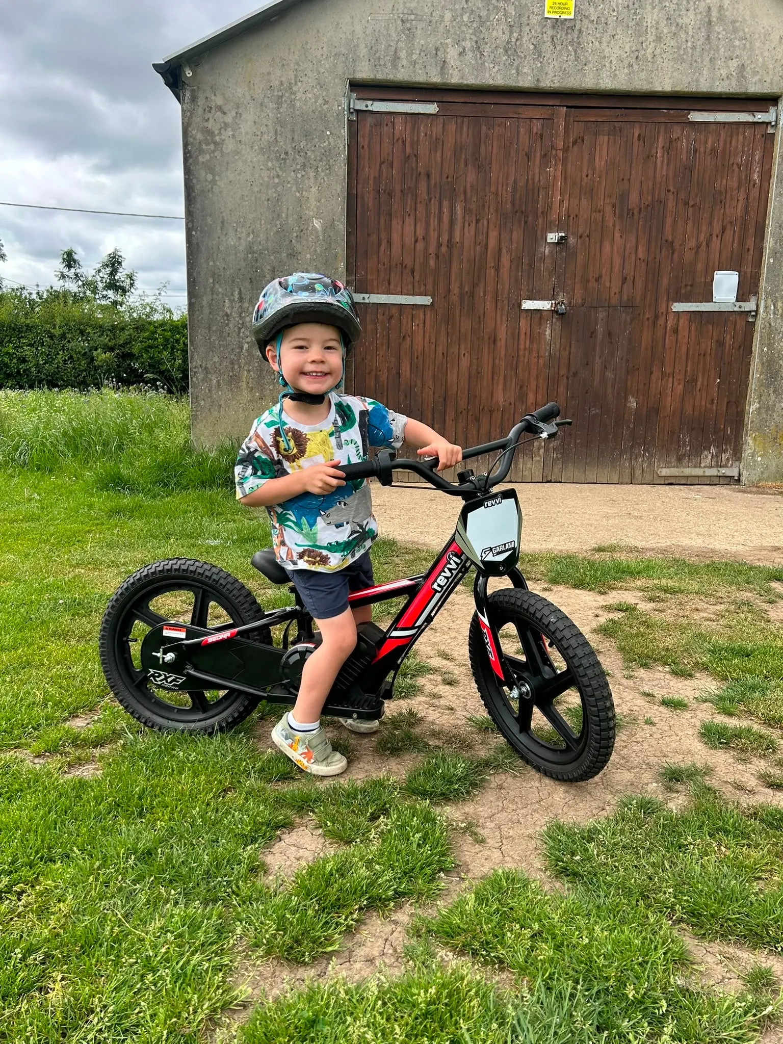 Young child riding a small electric balance bike